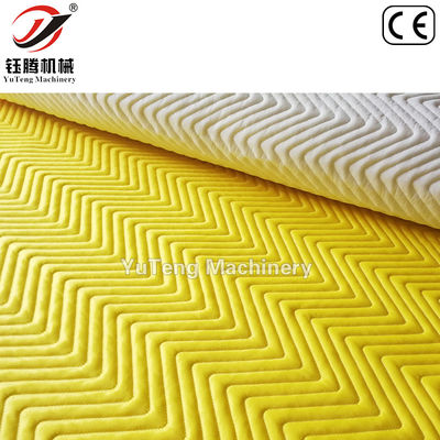 Macchina per coperte da computer con navetta a più ago